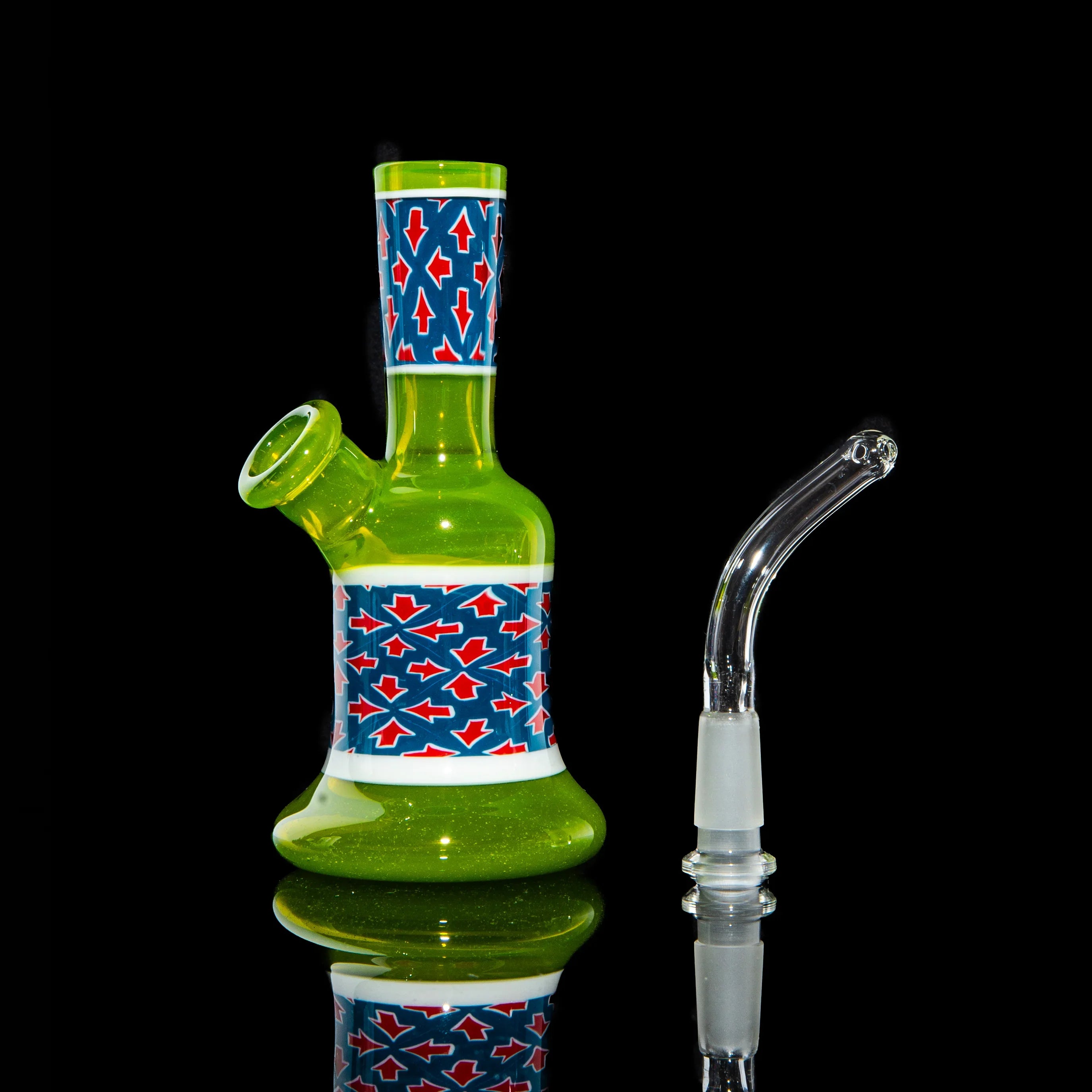 Green glass mini water pipe with blue and red arrow patterns, shown with clear glass adapter