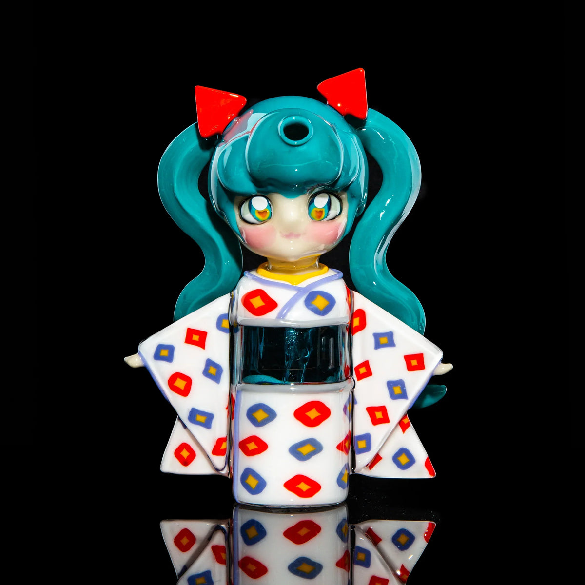 Anime-inspired glass pipe resembling a girl in a colorful kimono, black background