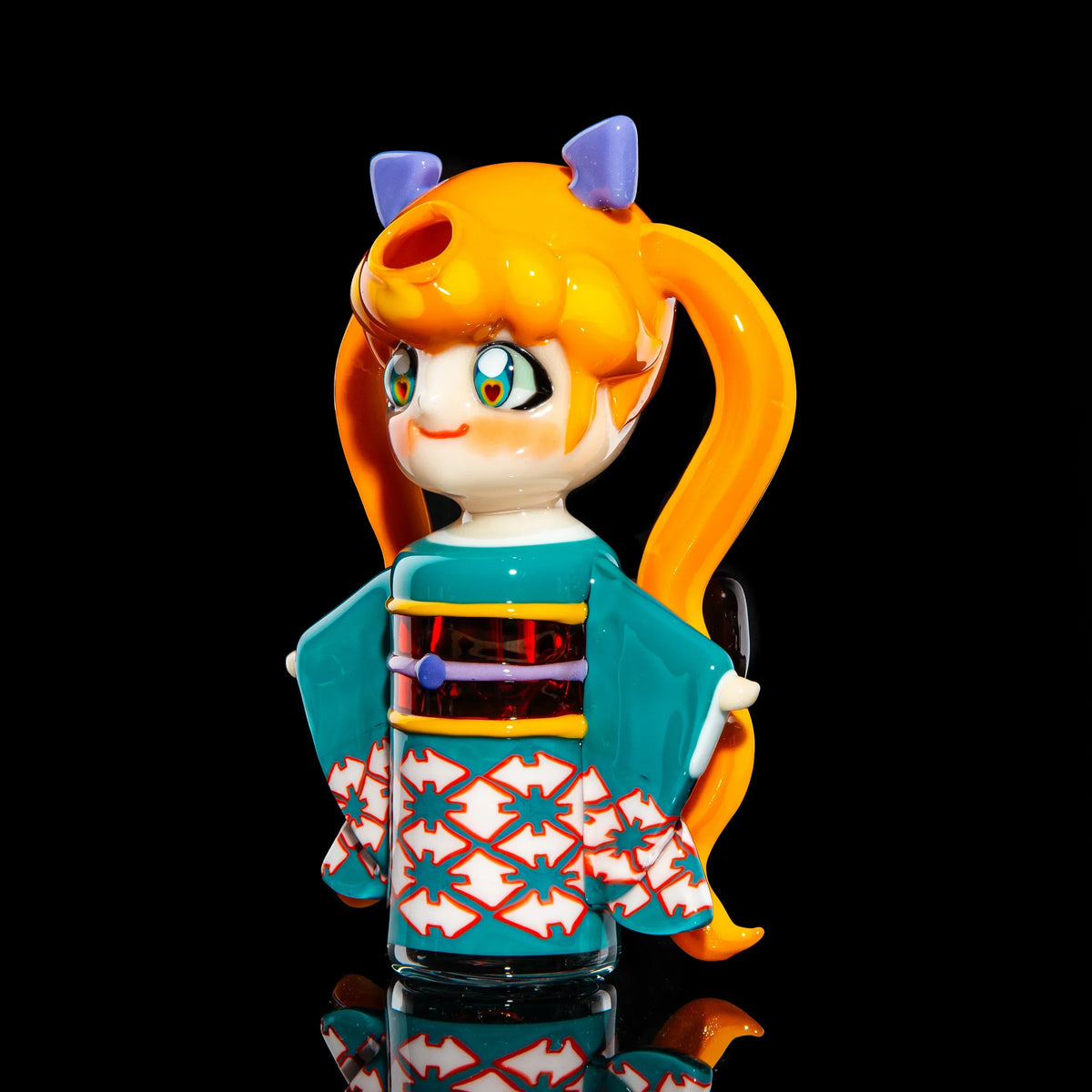 Anime-inspired glass water pipe with orange hair, teal kimono, and unique pattern accents.