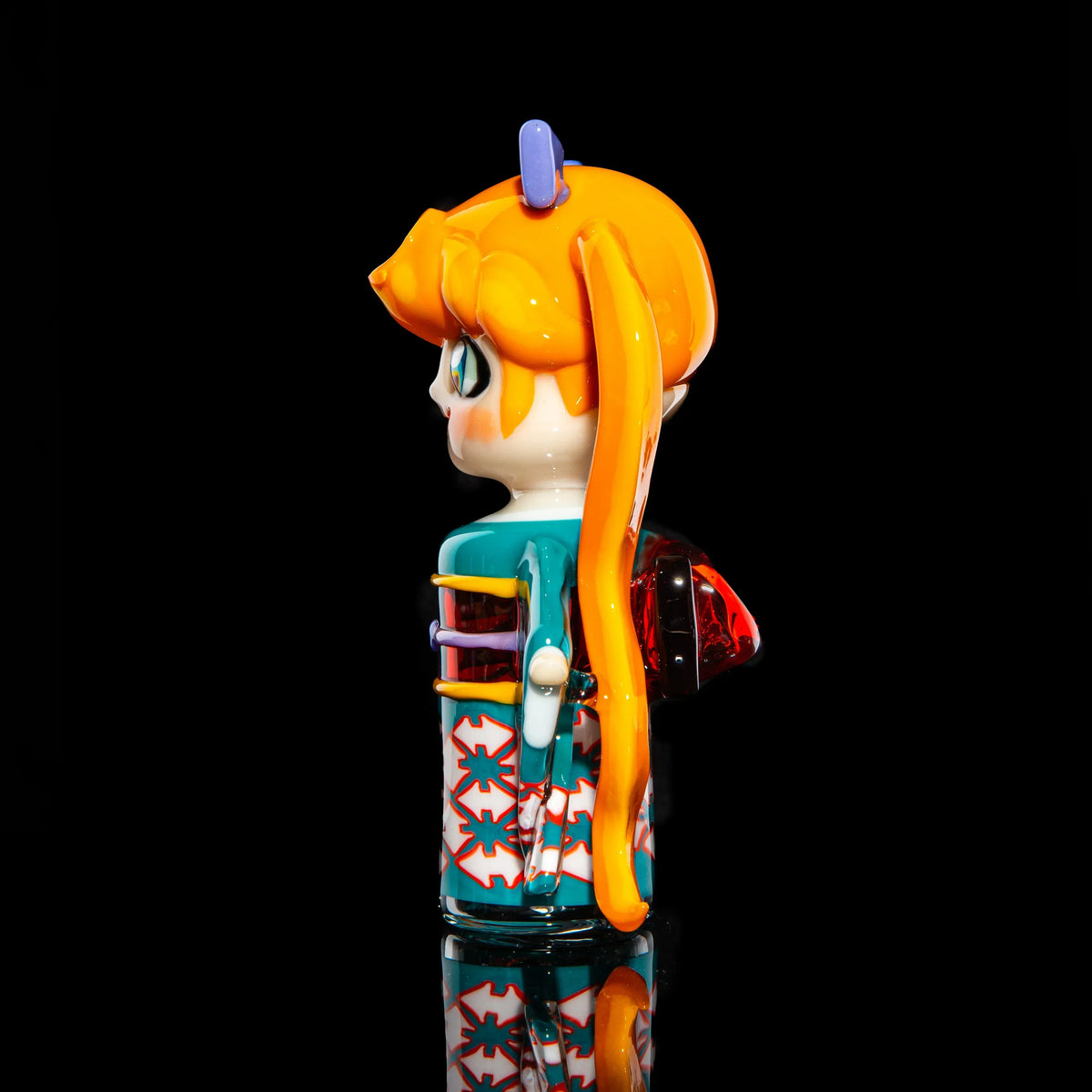 Handmade glass art figure with orange hair, anime style, detailed kimono, black background