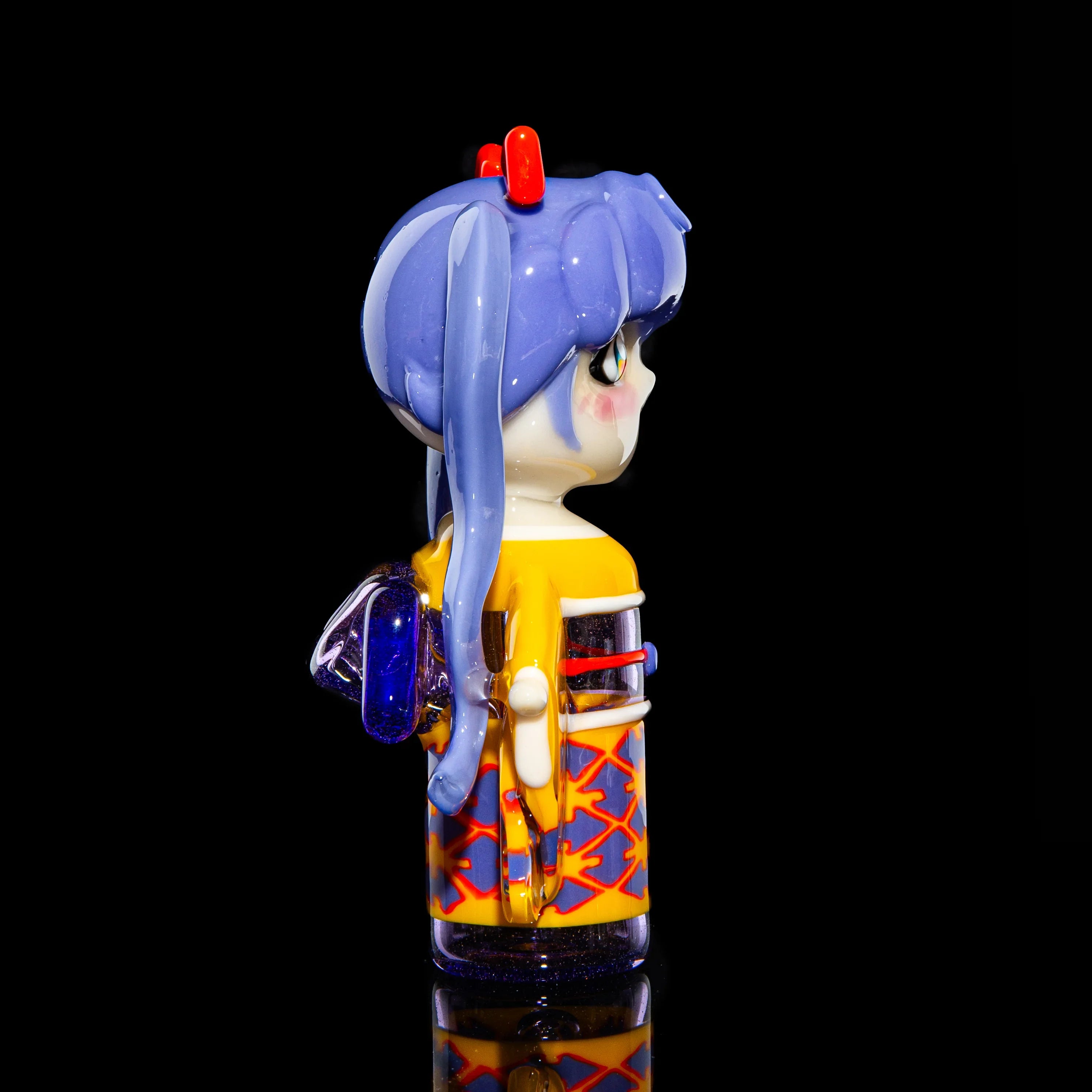 Handcrafted glass art pipe shaped like a kimono-clad anime character with blue hair