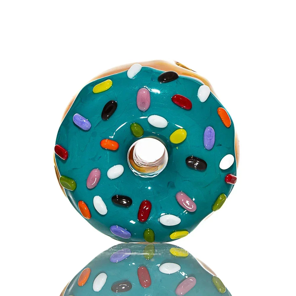 Blue raspberry frosted glass donut pipe with colorful sprinkle accents on white background.