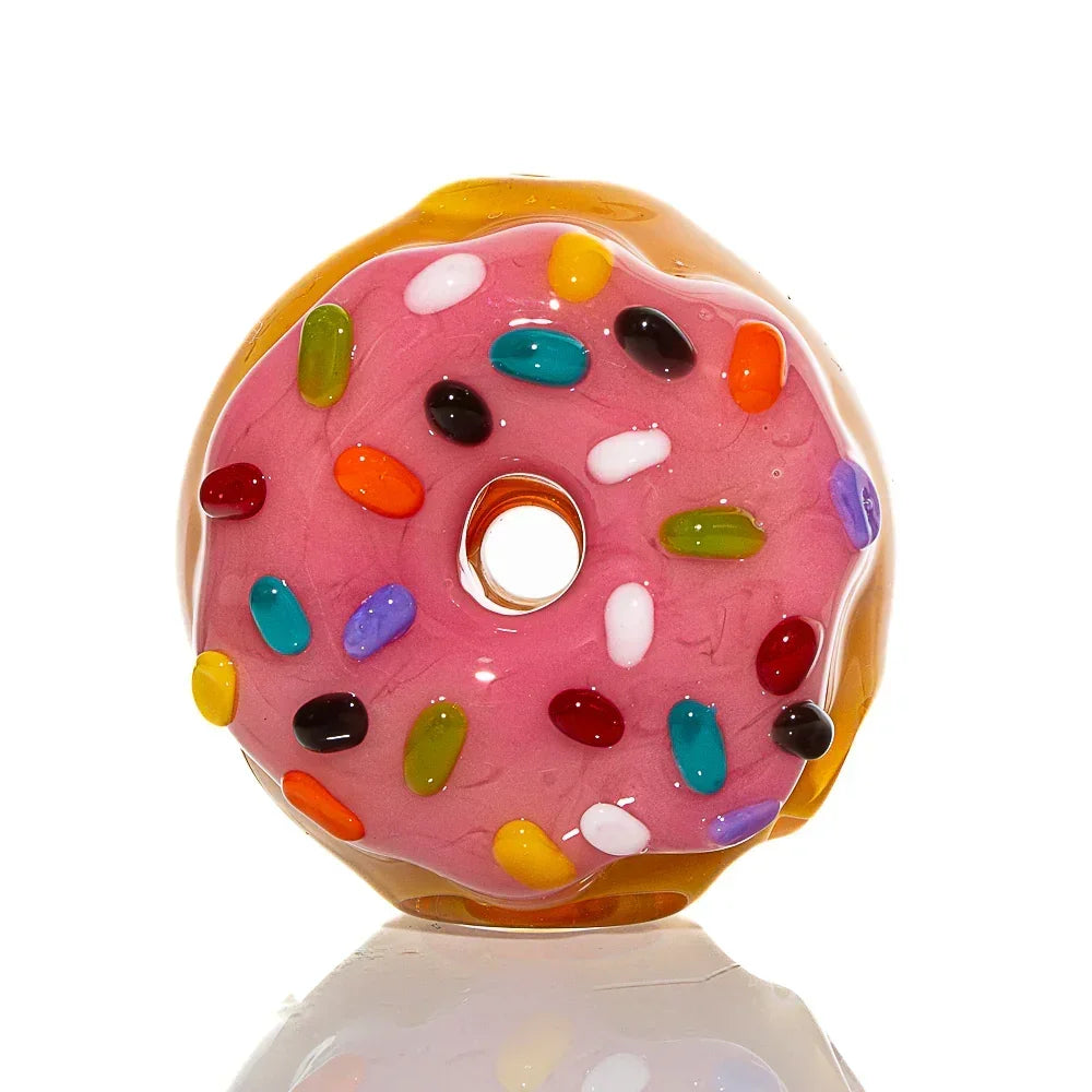 Glass donut hand pipe with pink frosting and colorful sprinkles, novelty smoking accessory