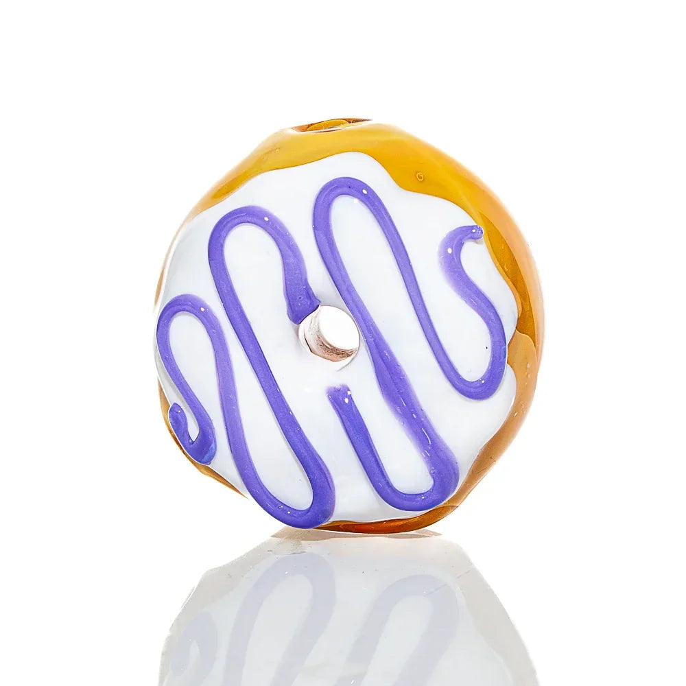 Glass donut hand pipe with white vanilla frosting and lavender drizzle design