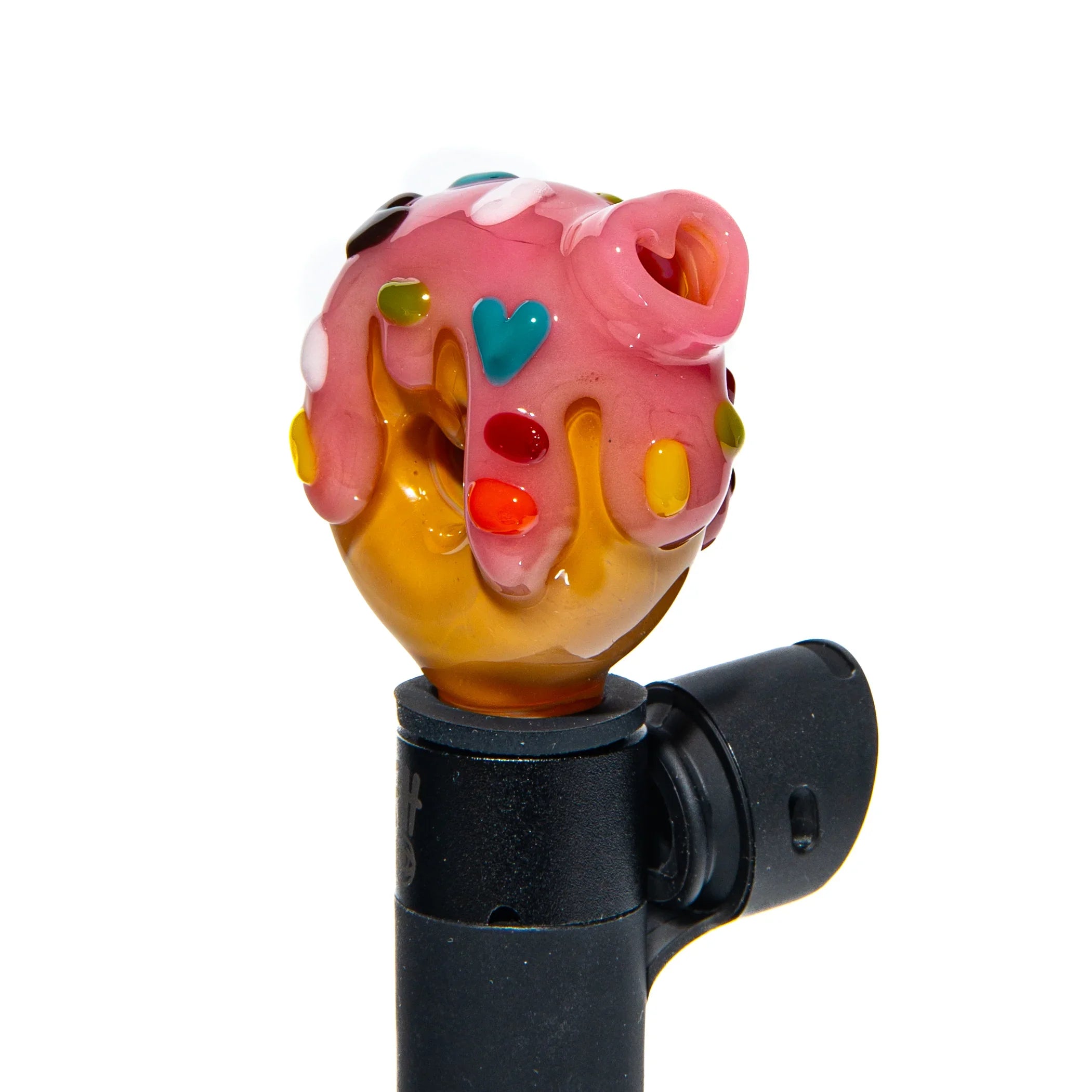 Colorful donut-shaped glass carb cap with pink icing, rainbow sprinkles, and heart accent