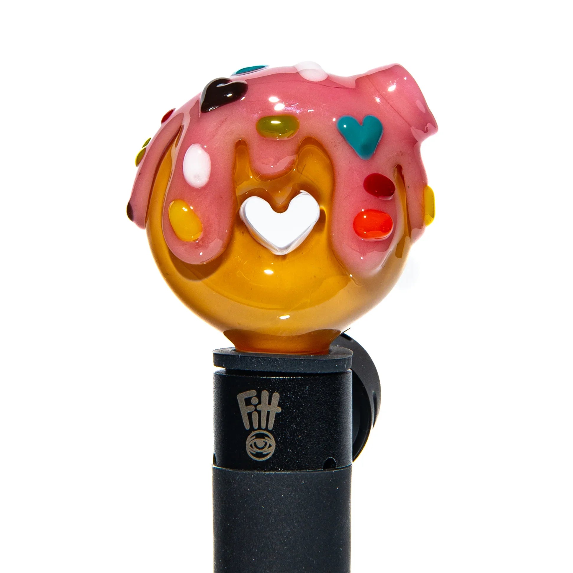 Colorful glass donut carb cap with pink strawberry drip and rainbow heart sprinkles
