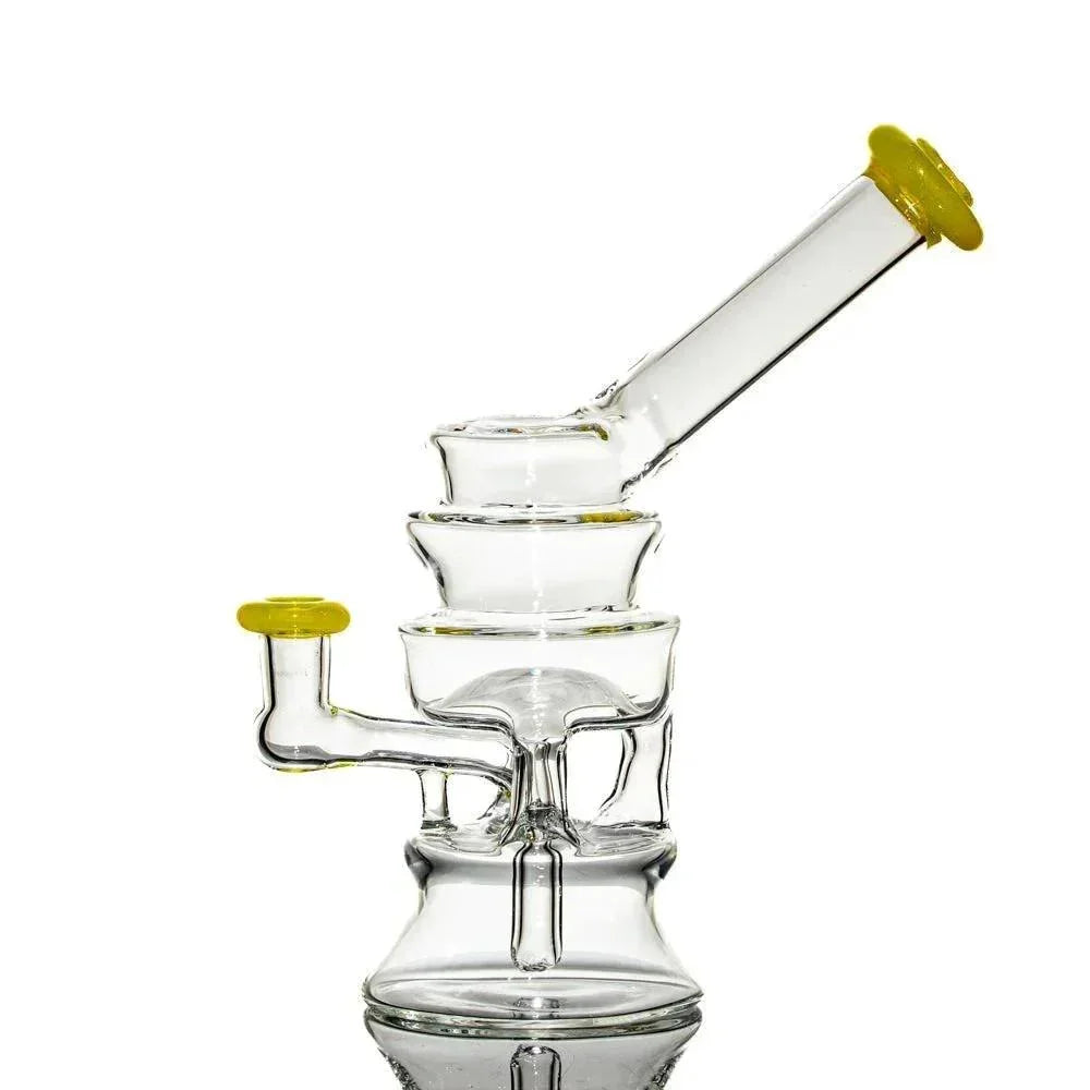 Clear glass water pipe with yellow accents and unique multi-chamber design on white background