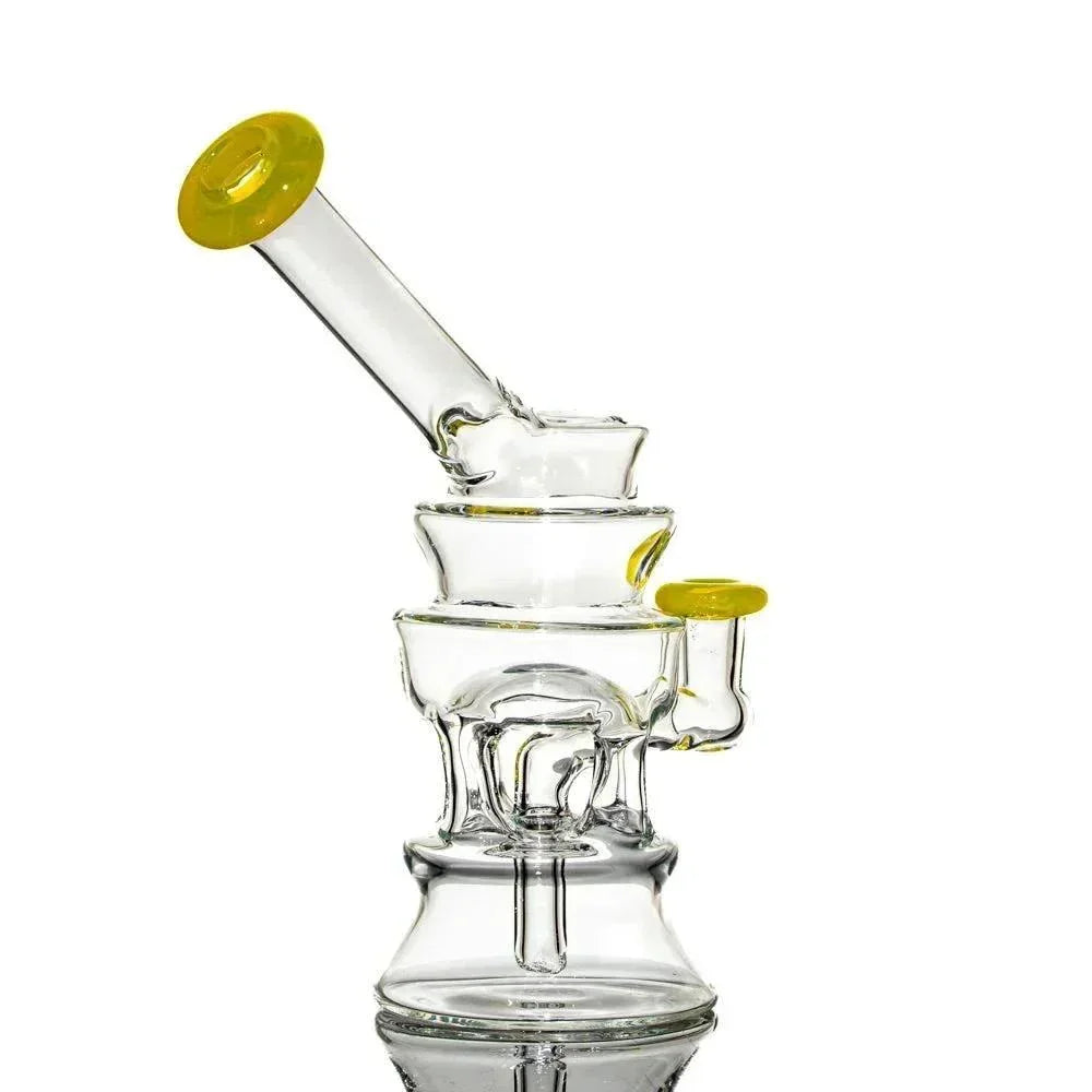 Clear glass water pipe with yellow accents, unique tiered design, isolated on white background