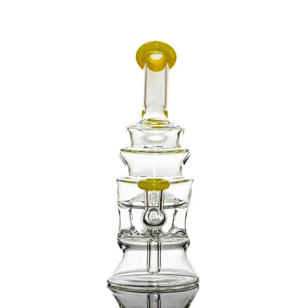 Clear glass water pipe with yellow accents and intricate percolator design.