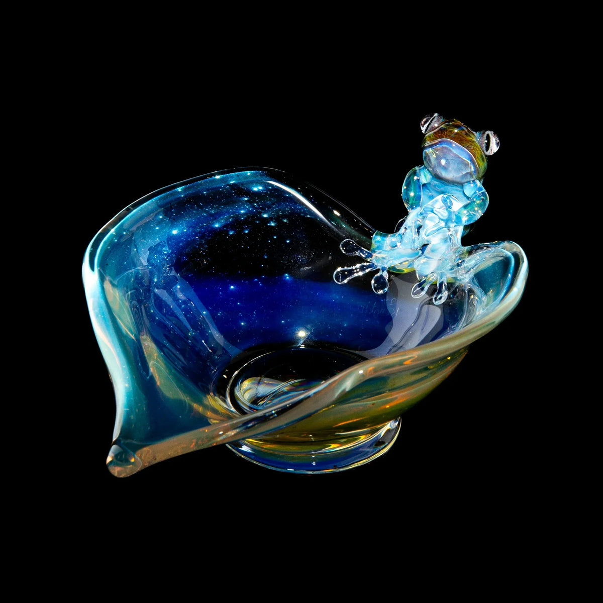 Handcrafted glass trinket dish with blue galaxy design and clear glass frog figure