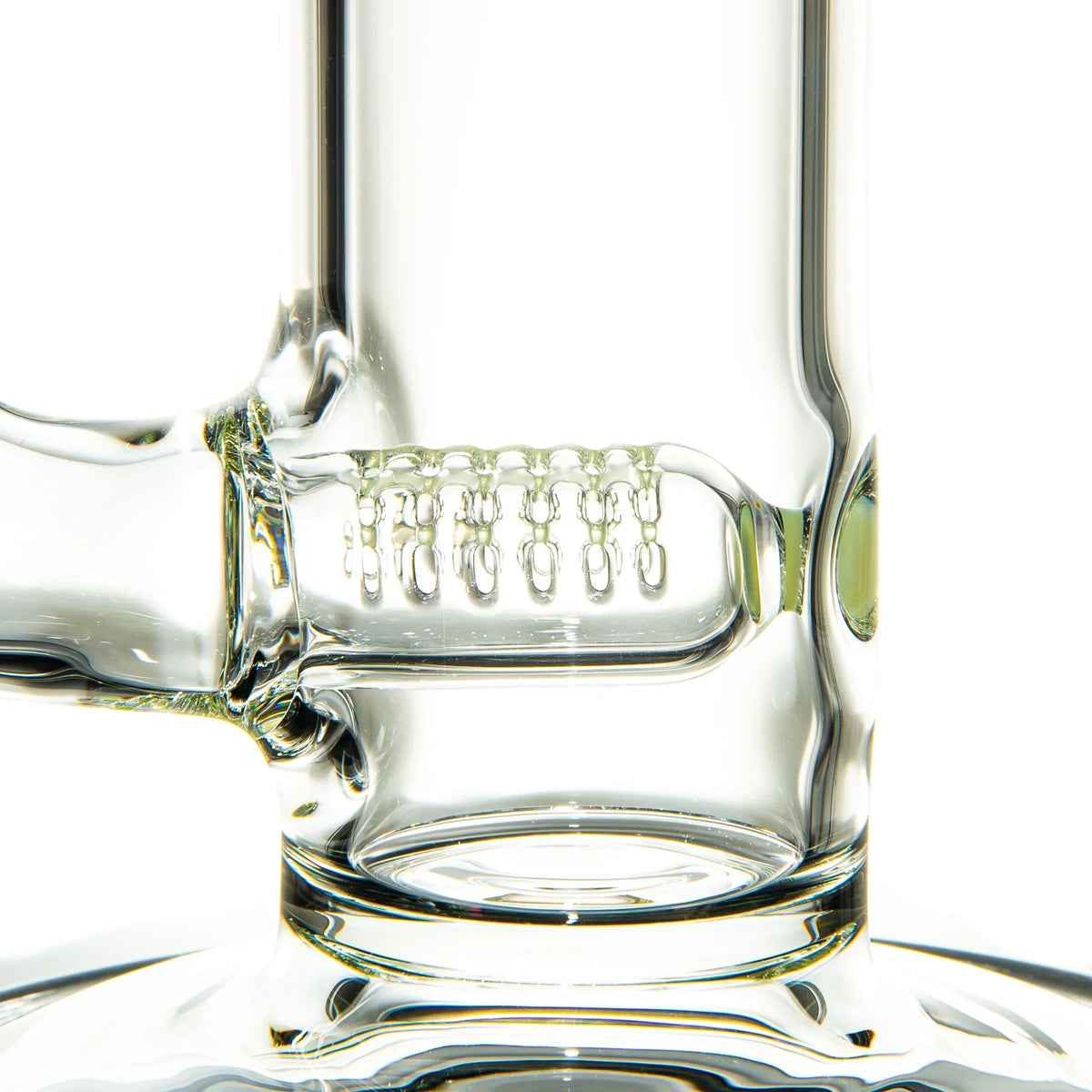 Close-up of glass water pipe with inline perc, clear scientific glass detail