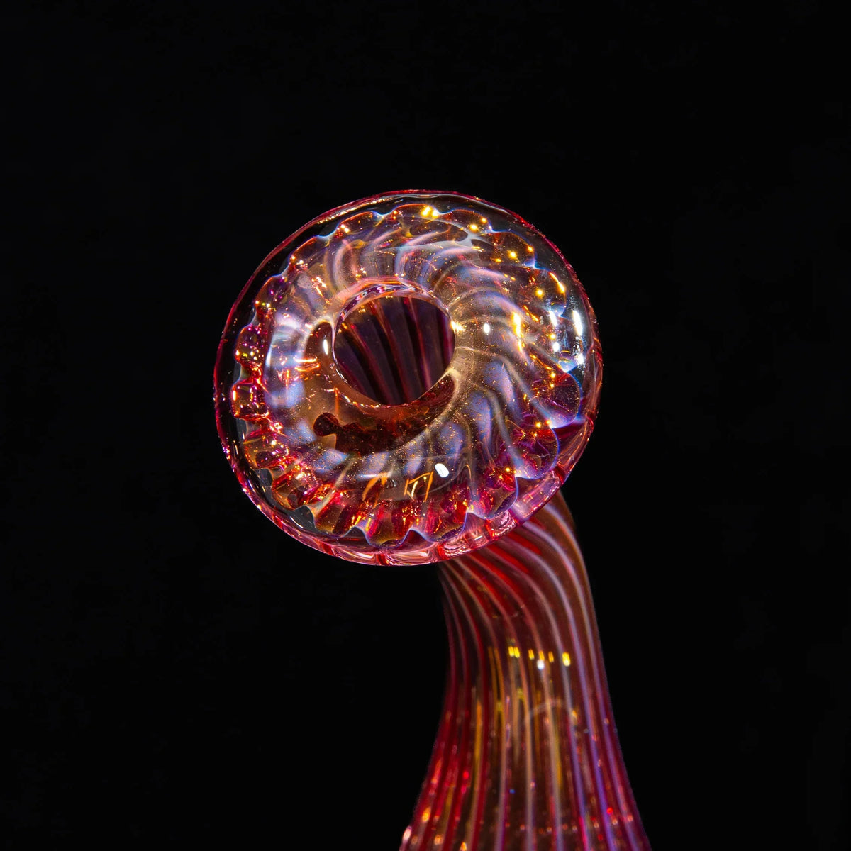 Hand-blown large fume sherlock glass pipe with swirling red and gold accents on black background