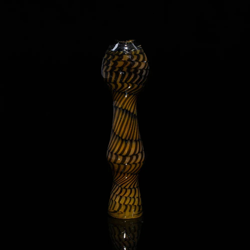 Brown spiral glass chillum pipe with coil pattern on black background