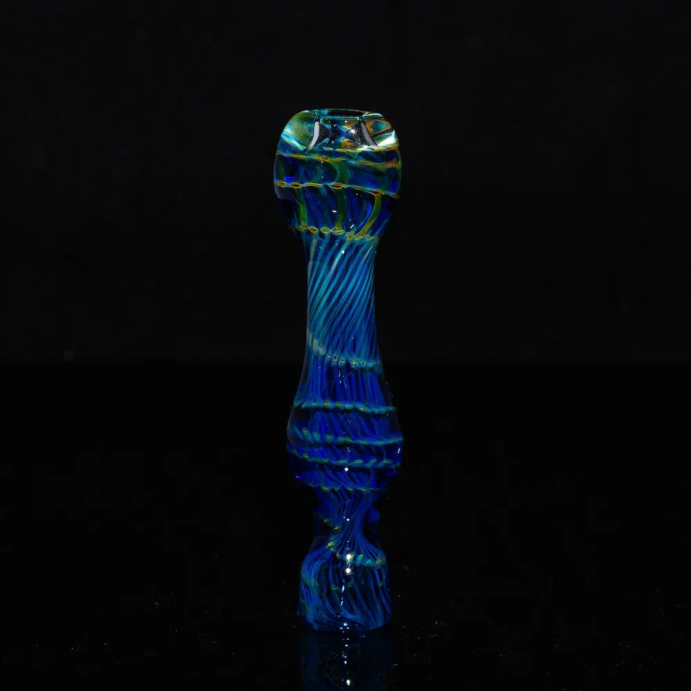 Hand-blown blue glass chillum pipe with swirled coil design on a black background