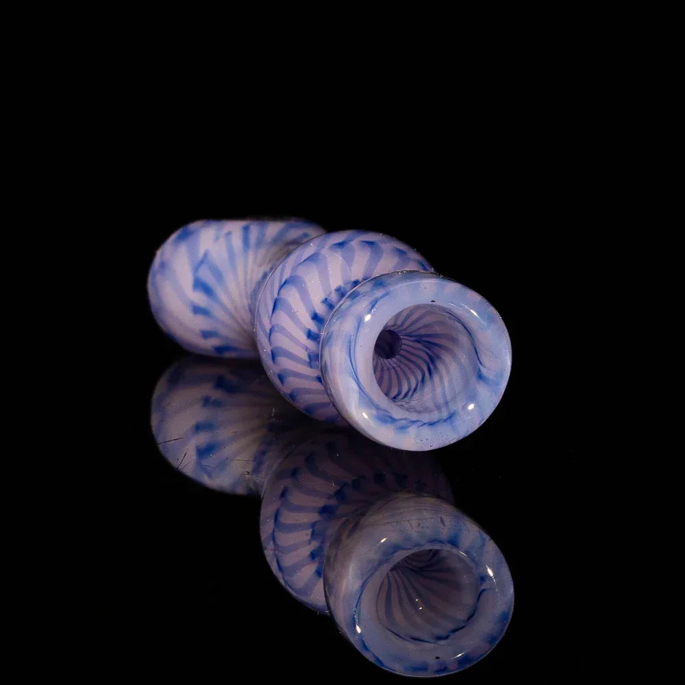 Light blue glass chillum pipe with spiral design on reflective black background