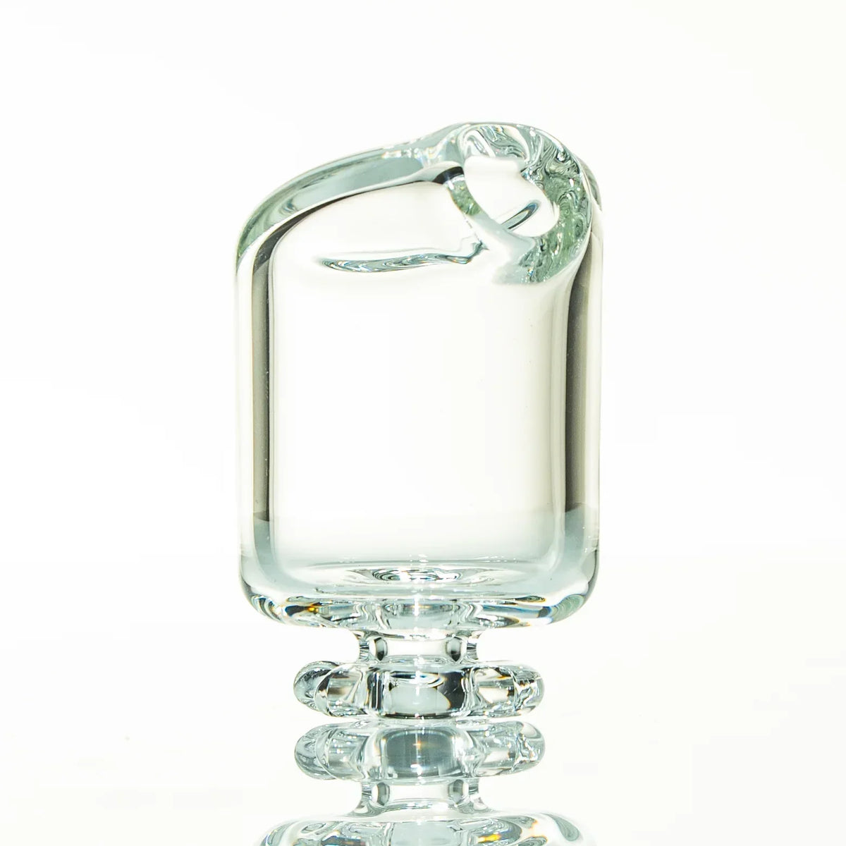 Clear glass pivot mouthpiece accessory with unique rounded design and smooth finish
