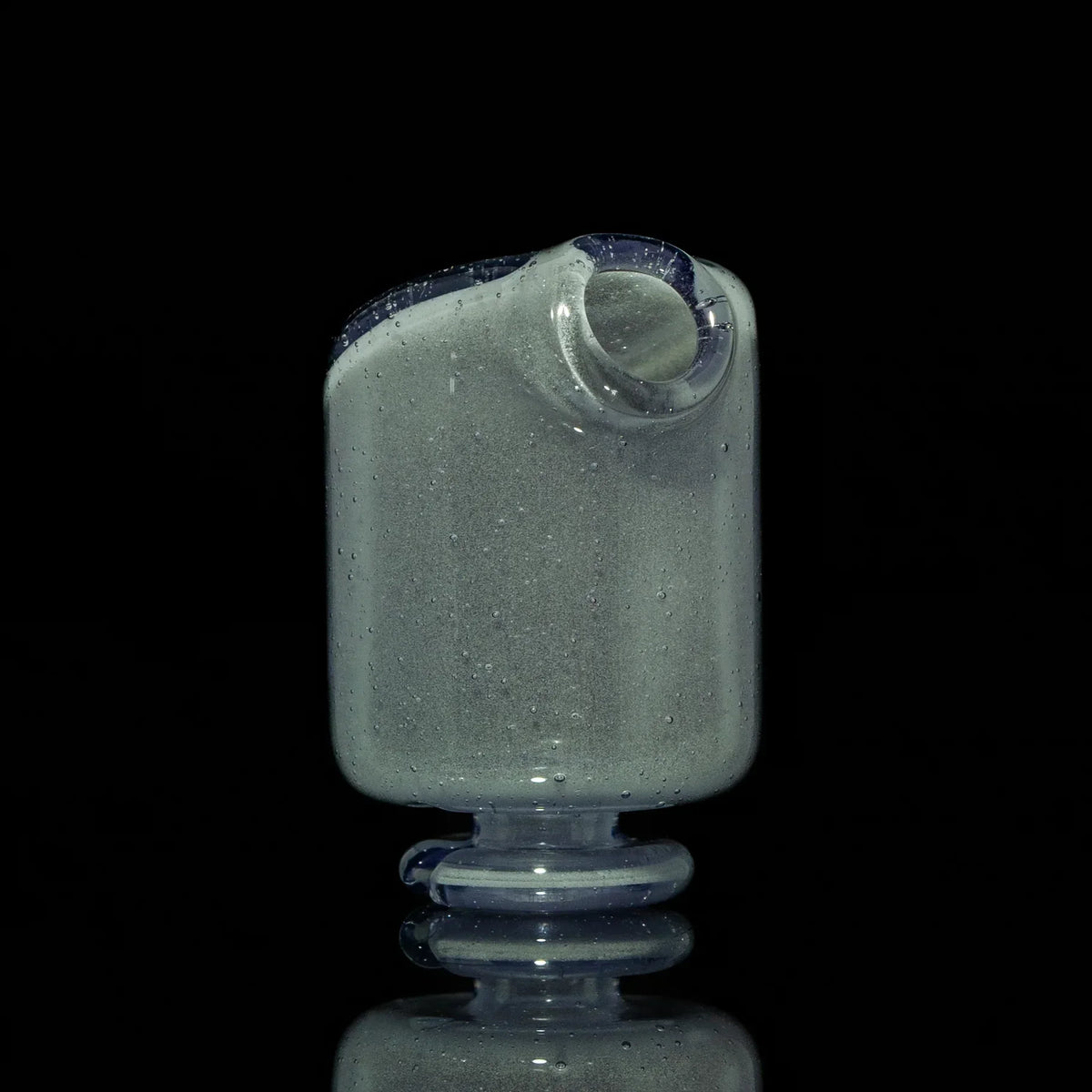 Iridescent glass mouthpiece with bubbled texture and spiral base on black background