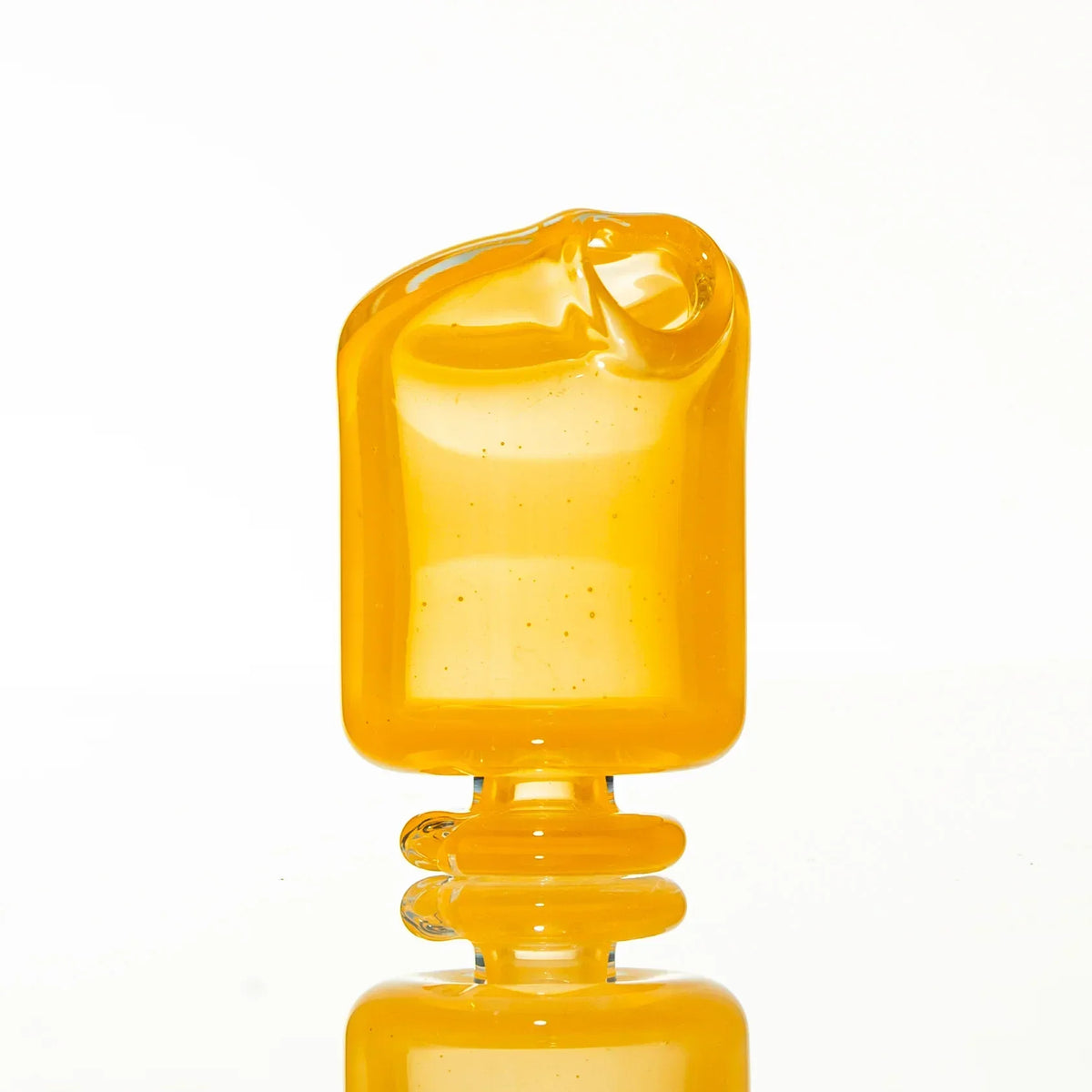 Yellow glass mouthpiece with smooth, glossy finish on a white background