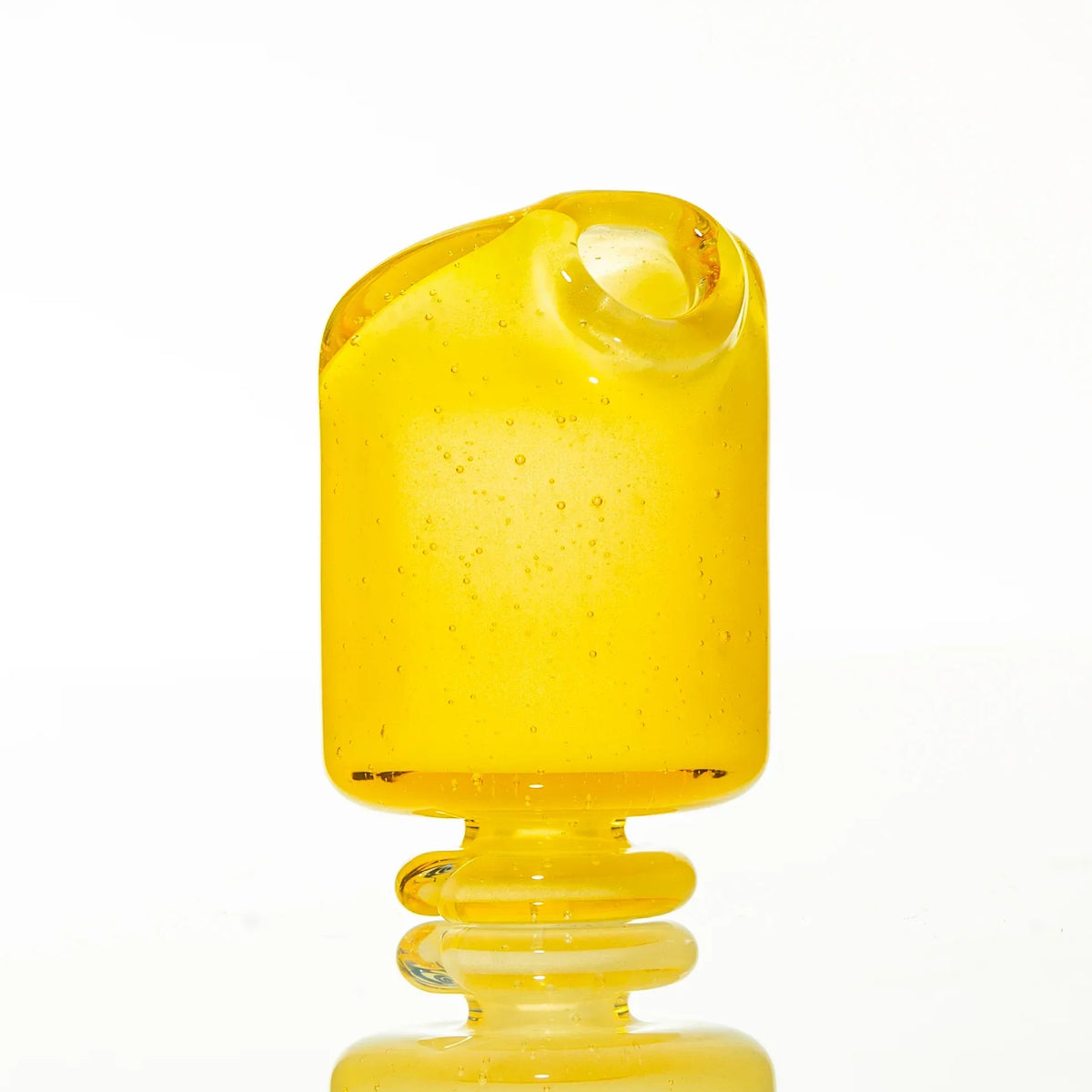 Yellow glass pivot mouthpiece with pearl detail on white background