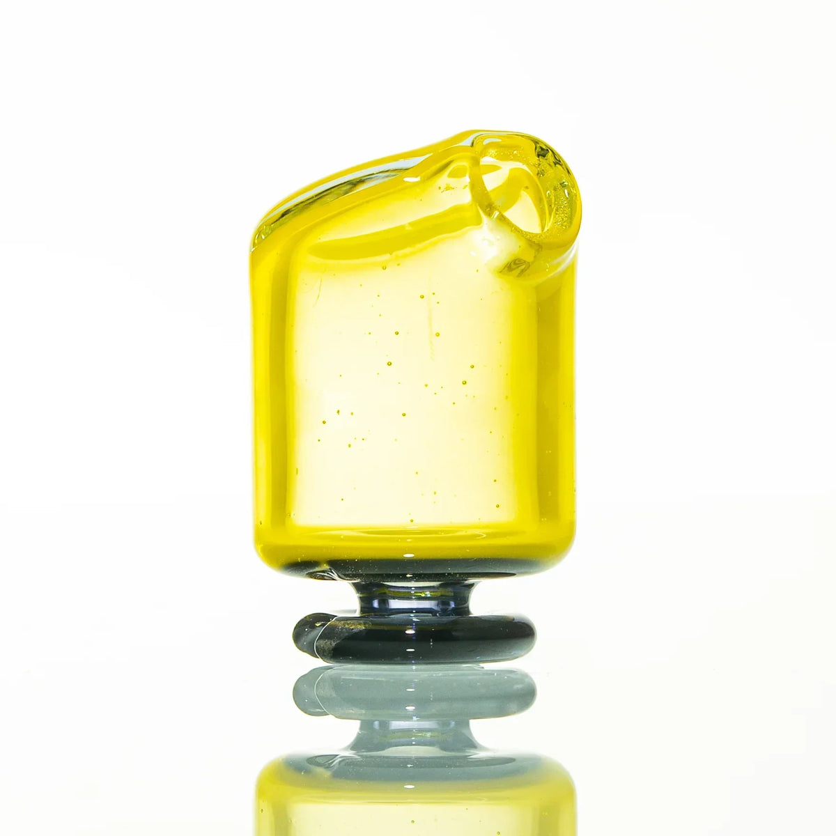 Yellow glass pivot mouthpiece with black and gray pearl accents on white background
