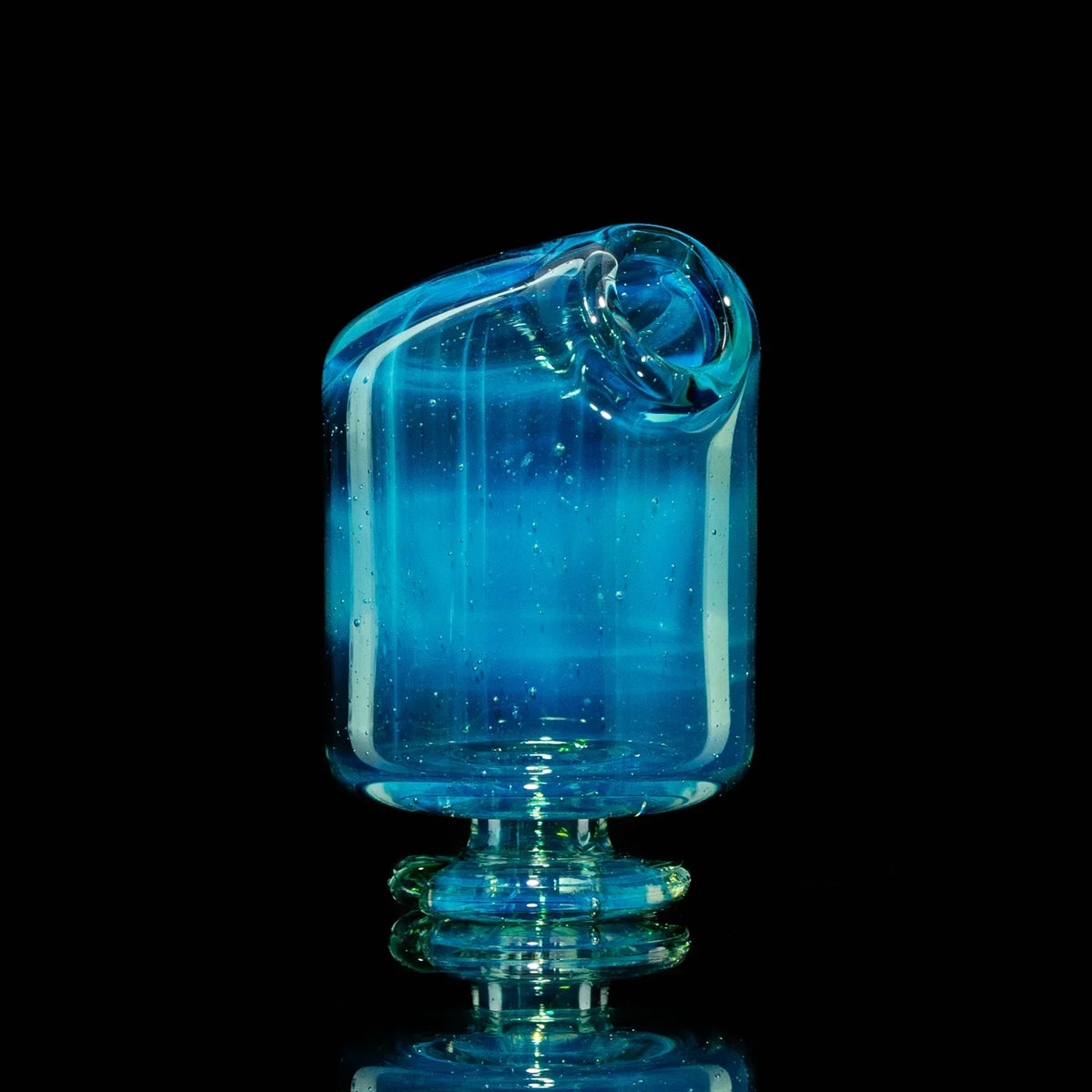 Blue glass pivot mouthpiece with pearl opal accents on a black background