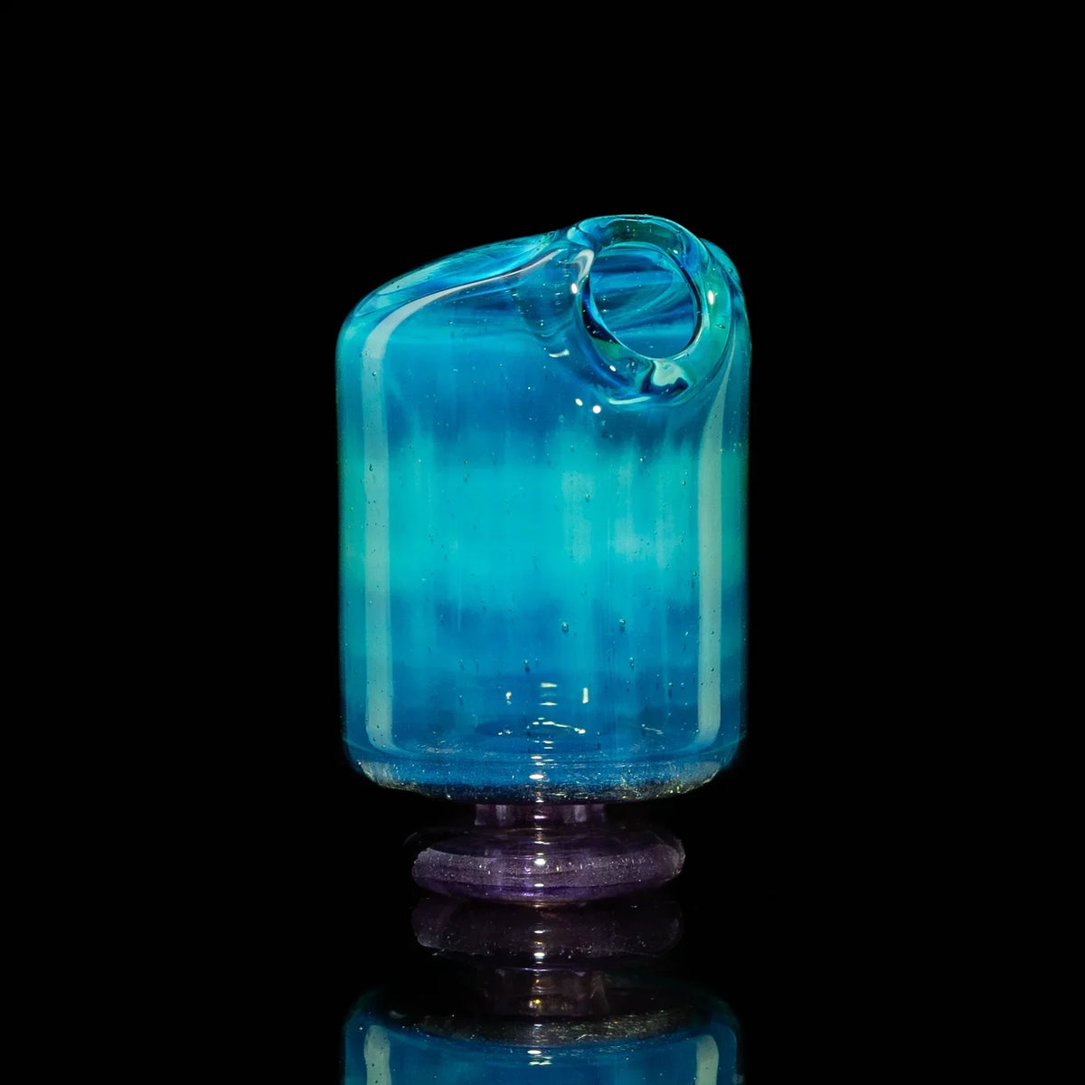 Blue glass pivot mouthpiece with opal and purple pearl accent on black background