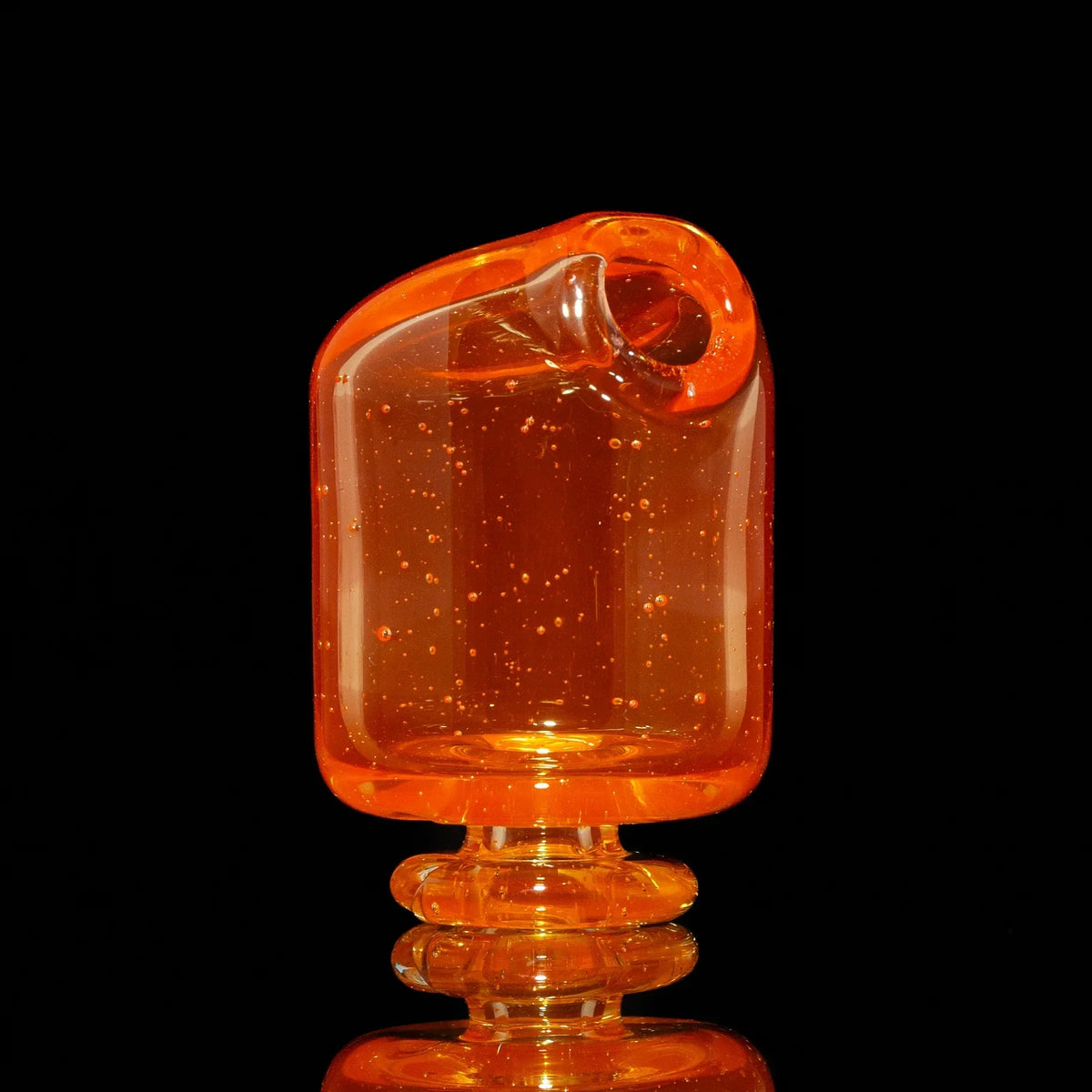 Orange glass pivot mouthpiece with bubble details on black background