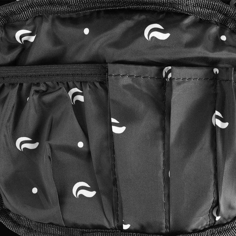 Black fabric pouch with multiple slots and white abstract patterns, close-up view