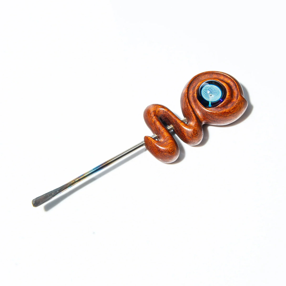 Curved wood and metal dab tool with glass art detail on white background