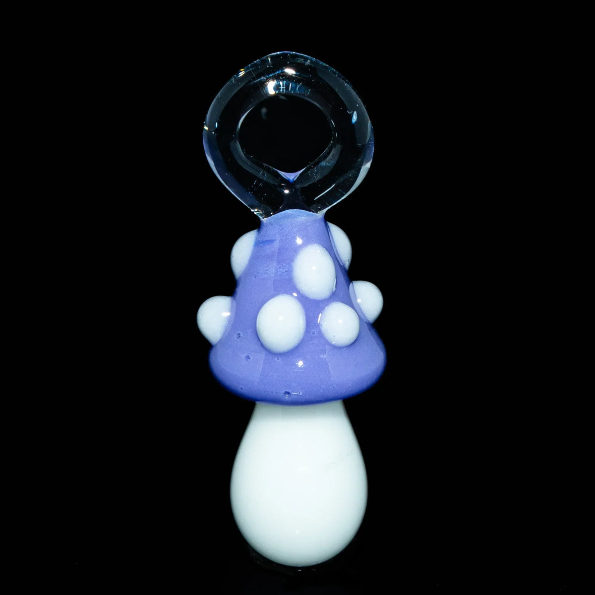 Purple mushroom glass pendant with white spots and clear loop, displayed on black background