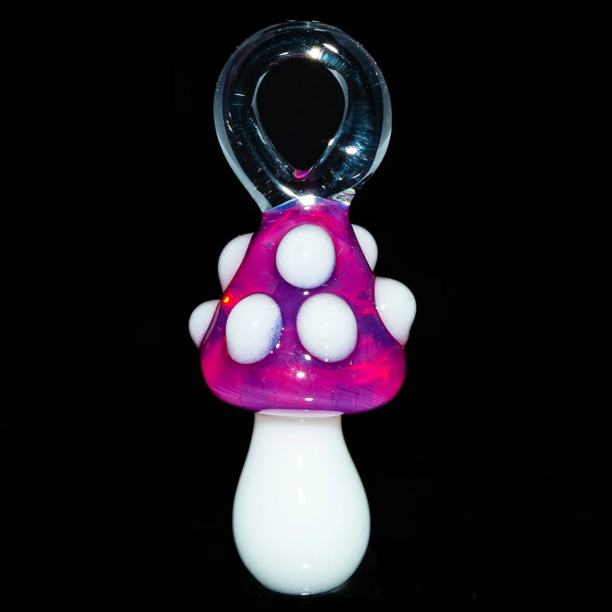 Telemagenta mushroom glass pendant with white spots and loop top on black background