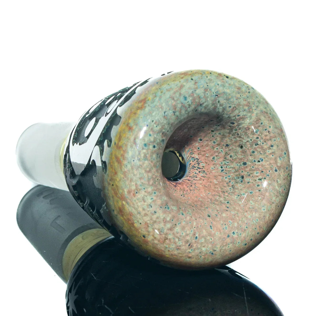 Close-up of a 14mm glass slide bowl with a meteor shower space design, colorful speckled finish.
