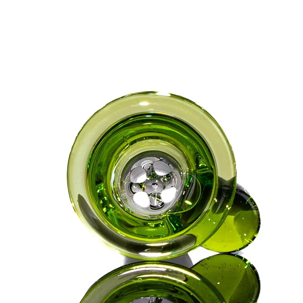 Green glass 14mm slide bowl with four-hole design, reflected on white background