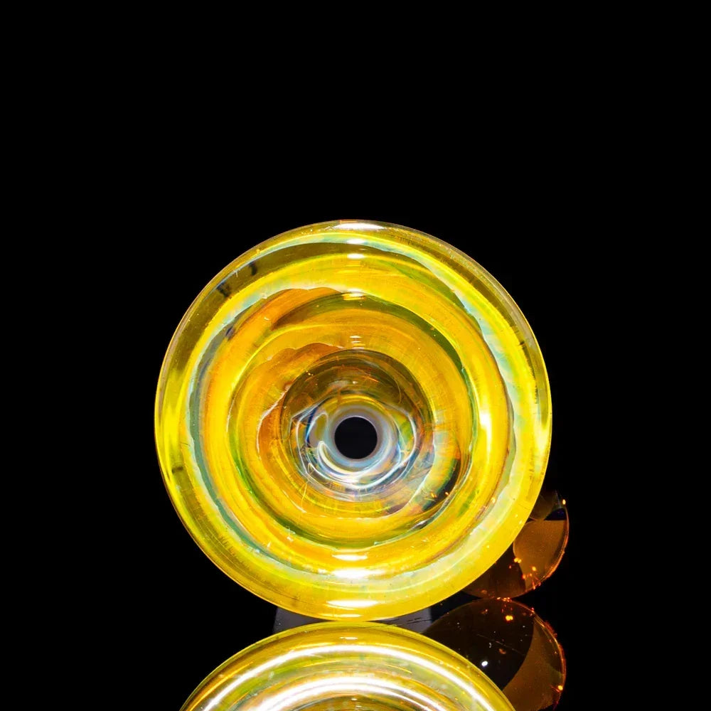 Yellow glass 14mm slide bowl with reflective surface, displayed on black background
