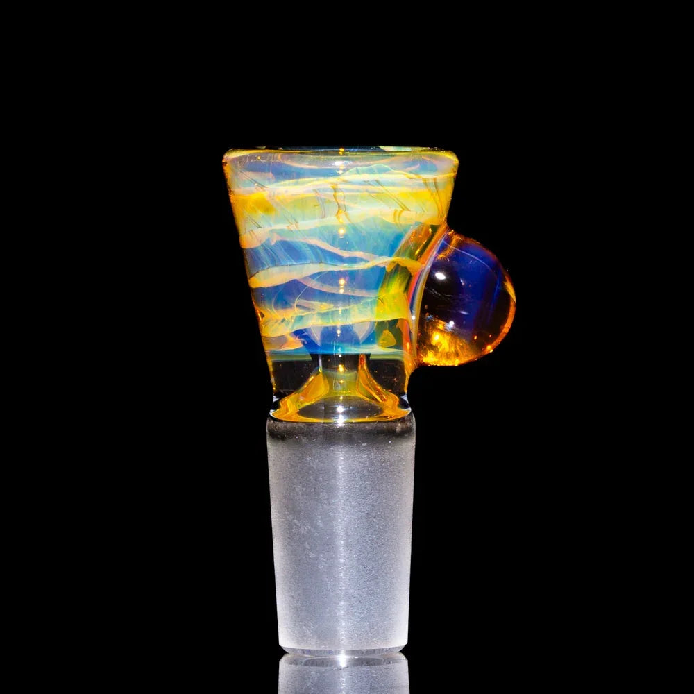 Colorful Northstar Yellow 14mm glass martini slide with swirled patterns on black background