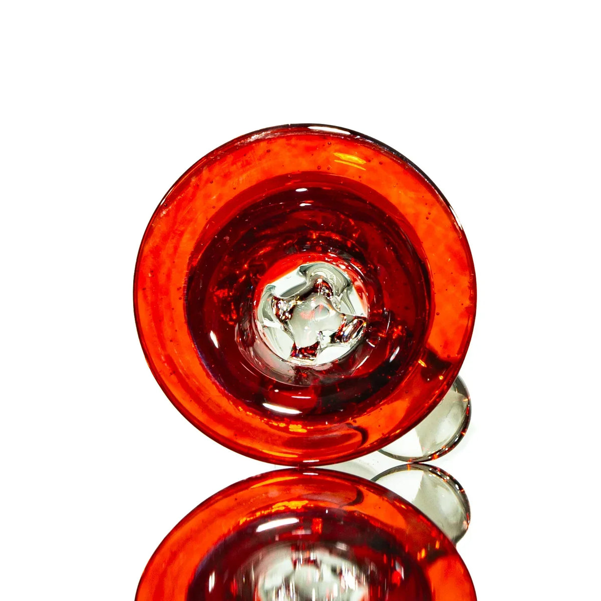 Red glass bowl slide with clear accents for water pipe, viewed from above on white background