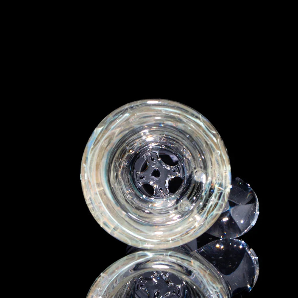Clear glass 14mm martini slide with silver fume wrap and four-hole design on black background