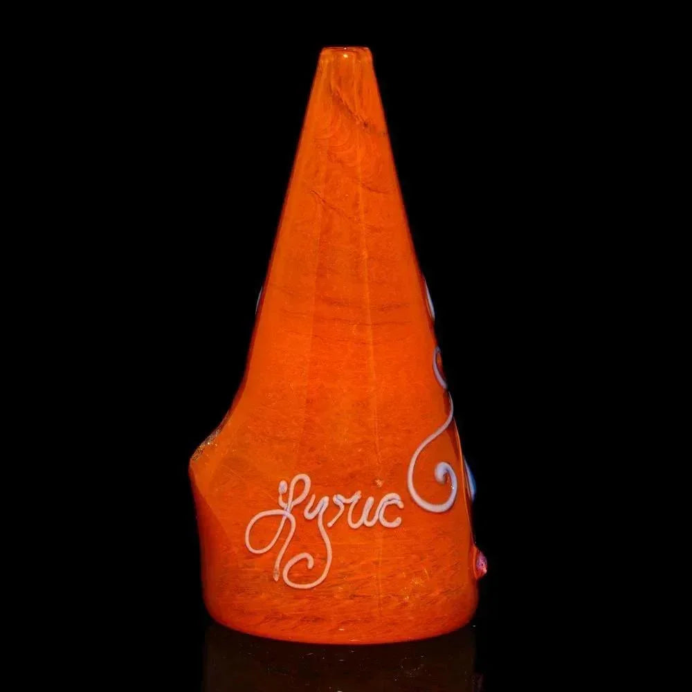 Cone-shaped orange glass rig with white 'lyric' text on black background