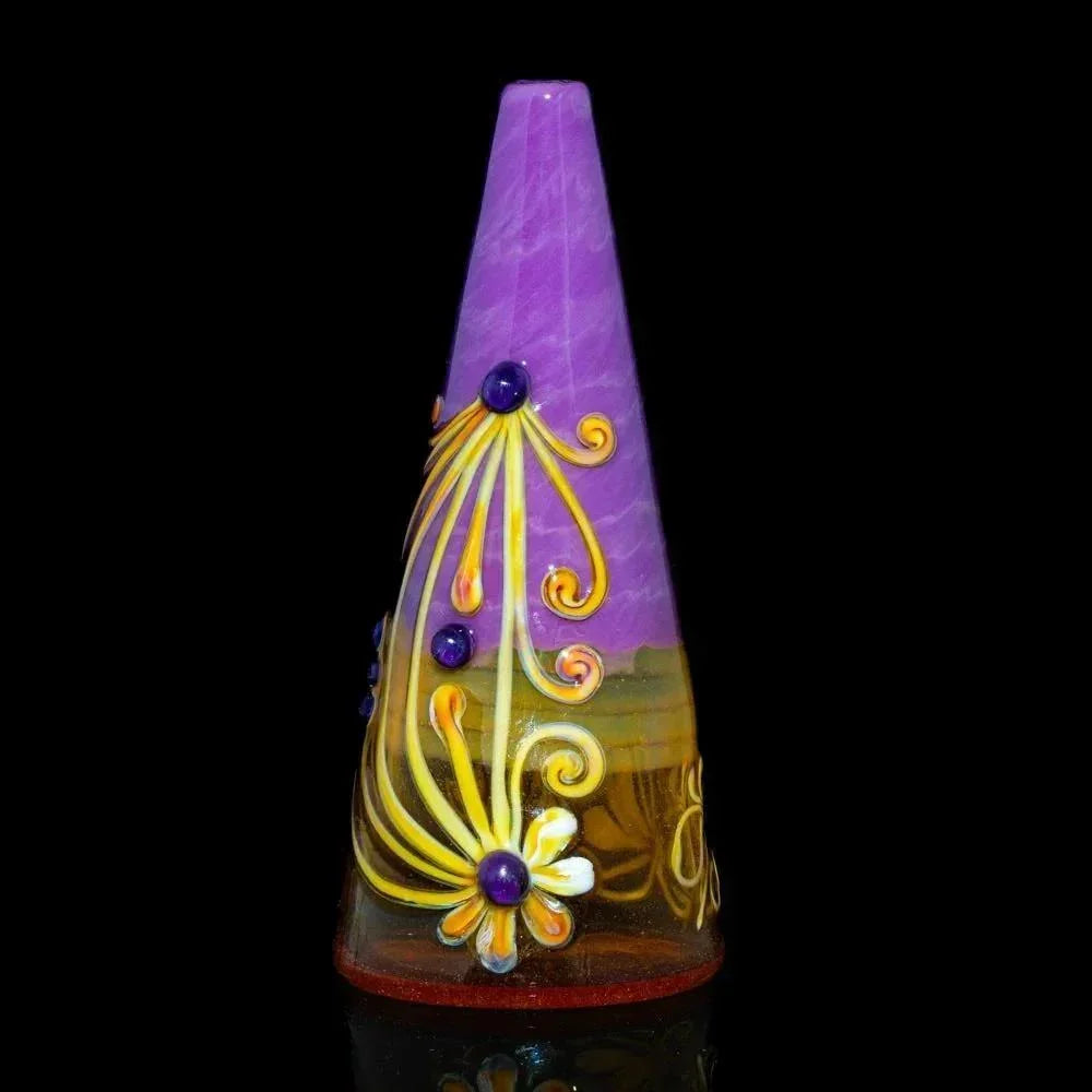 Cone-shaped violet glass rig with orange flower and yellow swirl accents, black background.