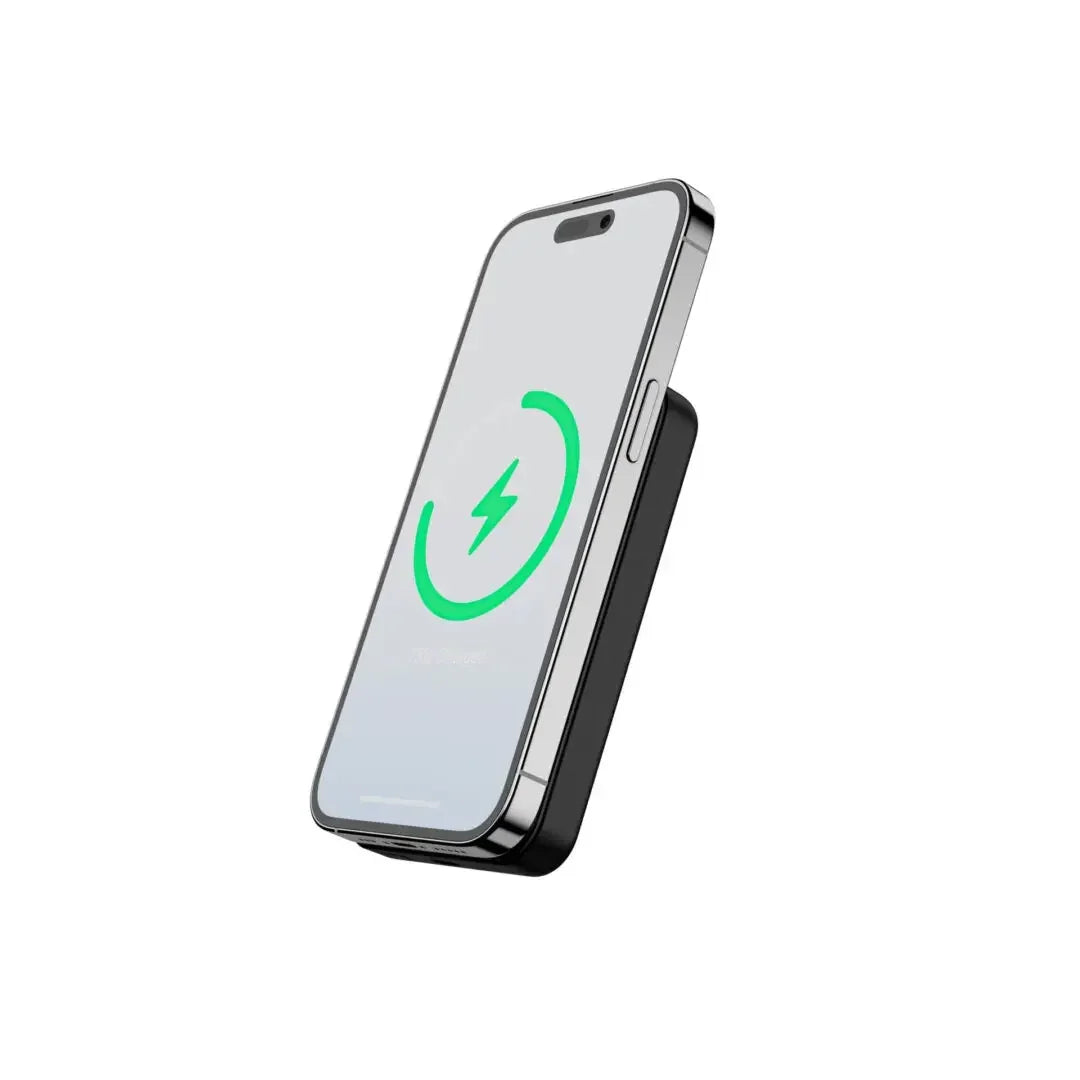 Smartphone with magnetic wireless charger attached, fast charging symbol displayed