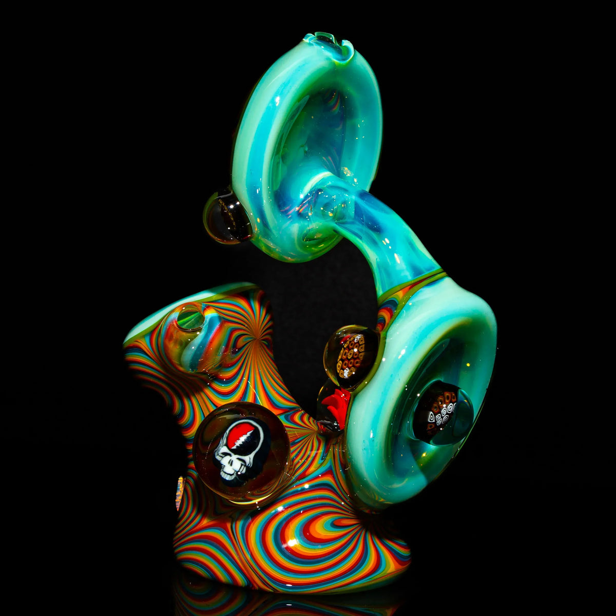 Colorful heady glass water pipe with swirling patterns and unique glass details on black background