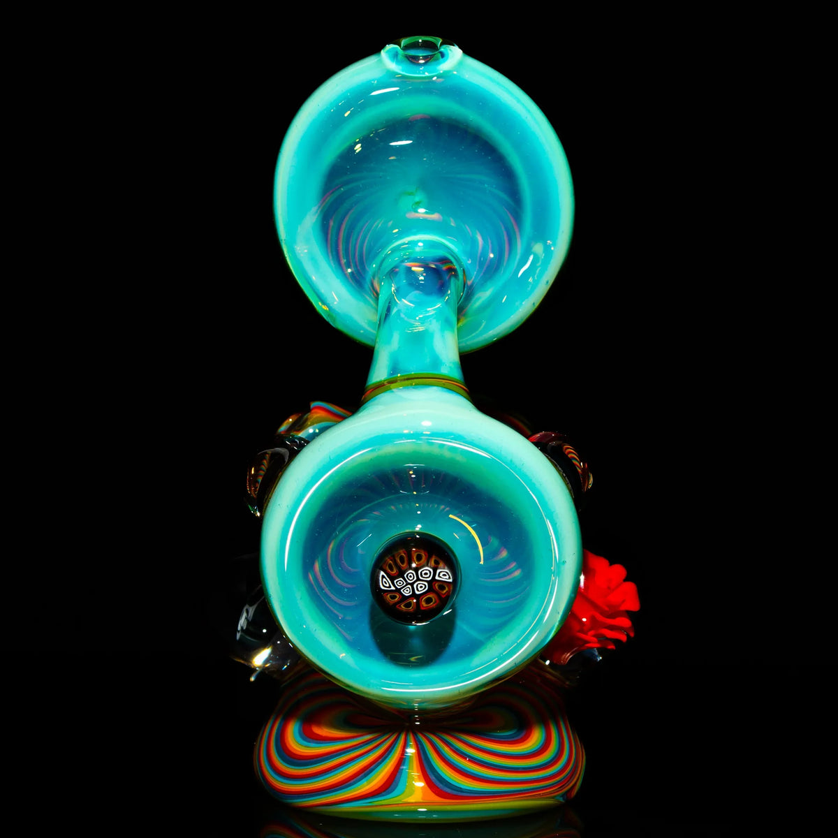 Colorful heady glass water pipe with teal accents and intricate rainbow patterns