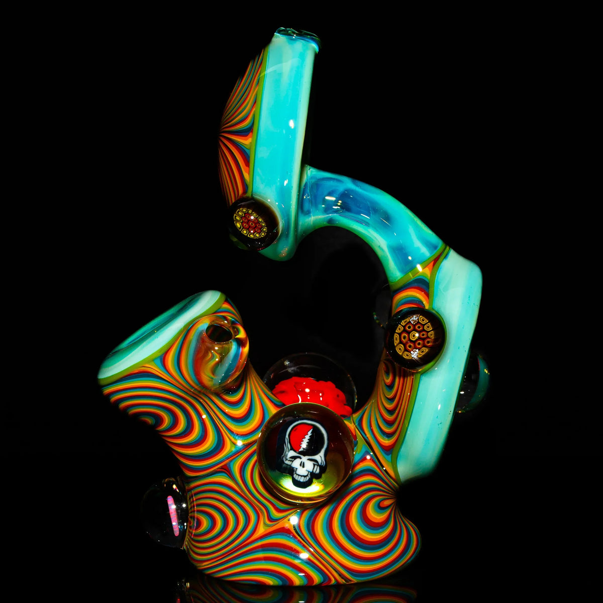 Heady glass art pipe with vibrant rainbow swirls and unique decorative designs on black background
