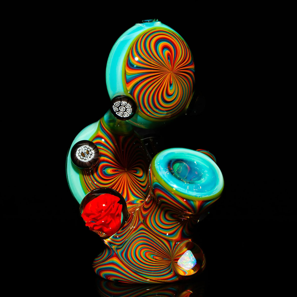 Colorful heady glass pipe with psychedelic swirl patterns and decorative accents