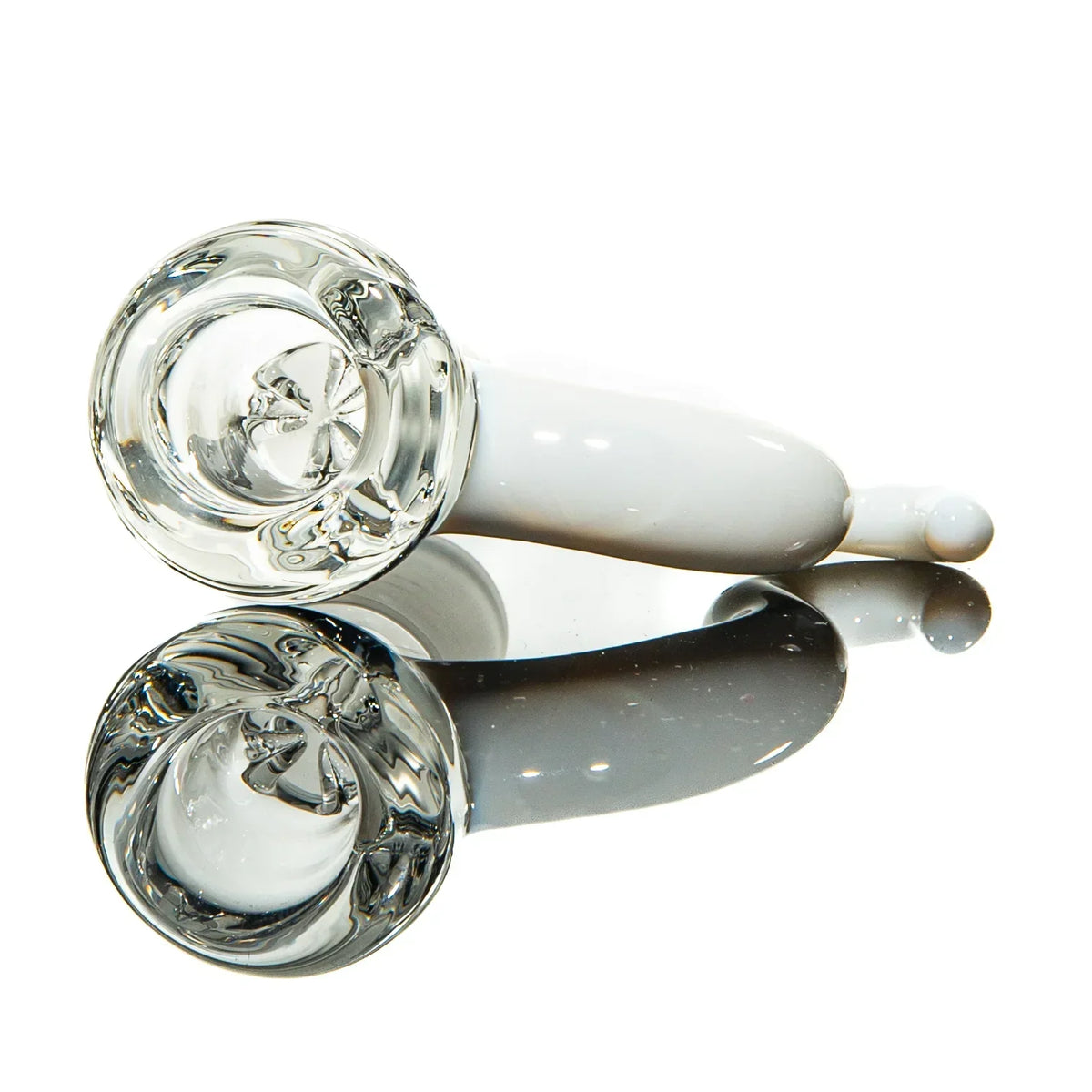 Clear and white glass smoking pipe with reflective surface, minimalist background
