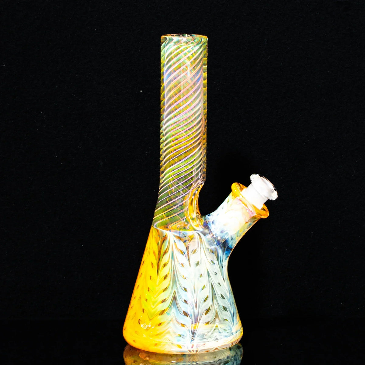 Colorful spiral neck glass mini tube with yellow and iridescent patterns against black background