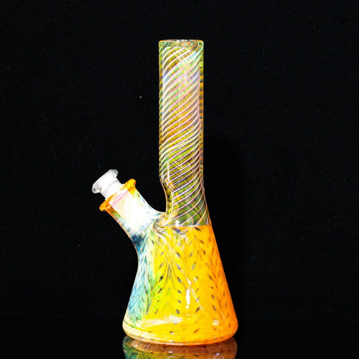 Colorful glass mini water pipe with spiral neck and rake pattern on black background