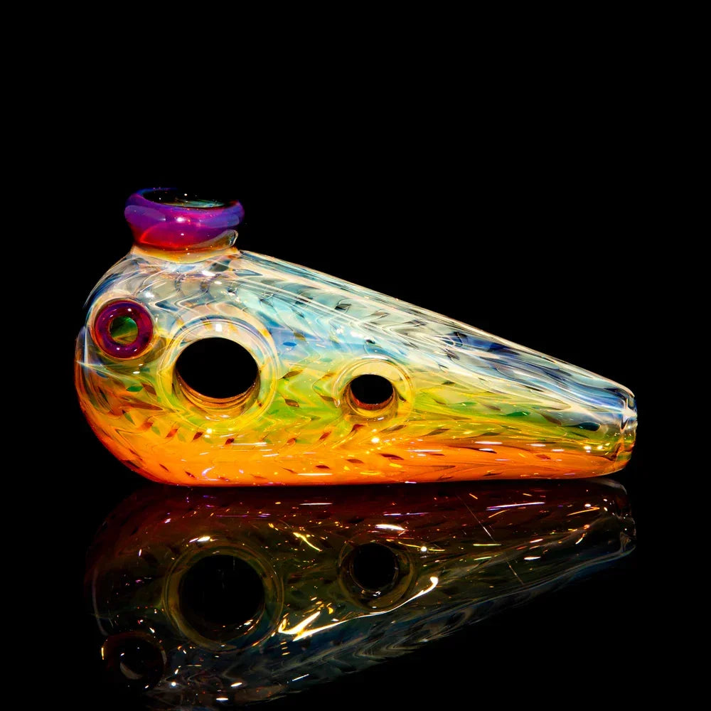 Colorful glass hand pipe with swirled rainbow pattern and multiple holes on black background