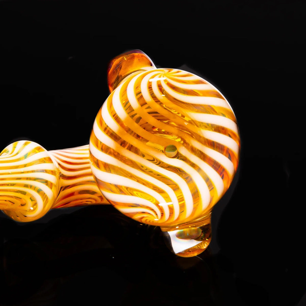 Amber and purple spiral glass Sherlock pipe with opal accent on black background