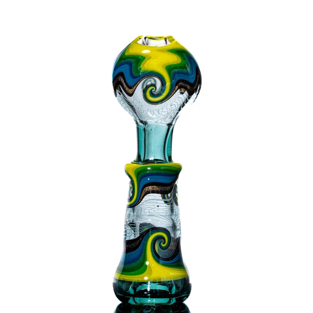 Colorful glass hand pipe with yellow, green, and blue swirl designs on a white background.